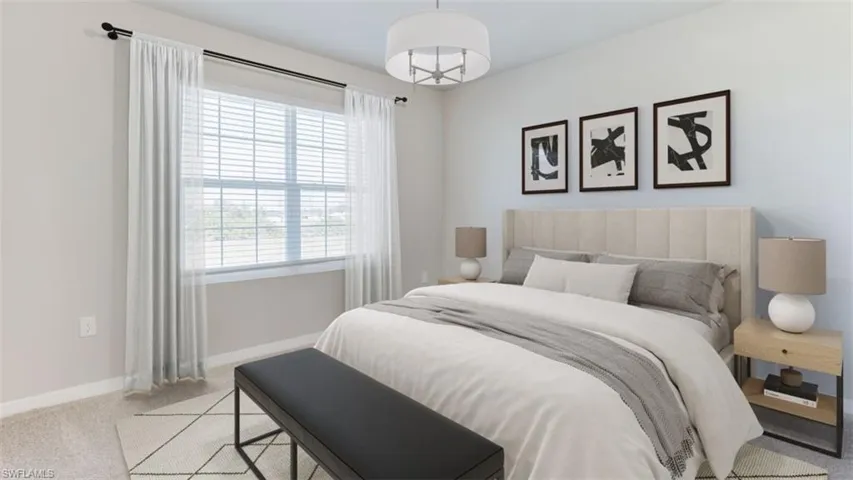 Bedroom with light carpet