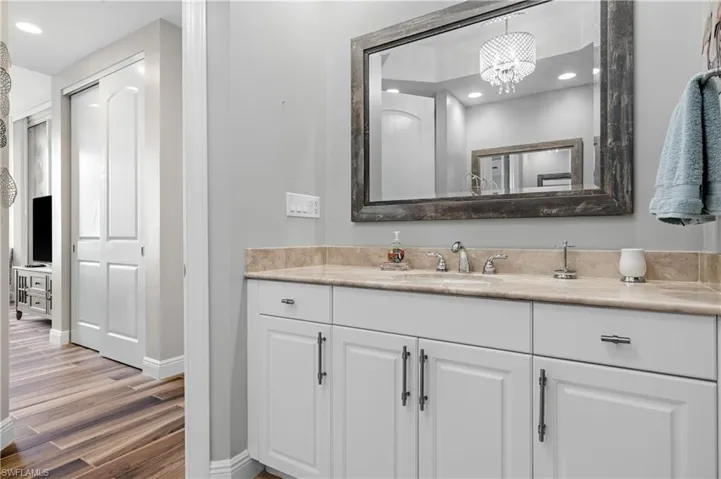 Bathroom featuring wood-type flooring and vanity