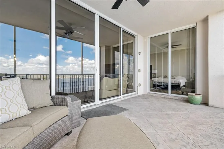 Sunroom featuring ceiling fan