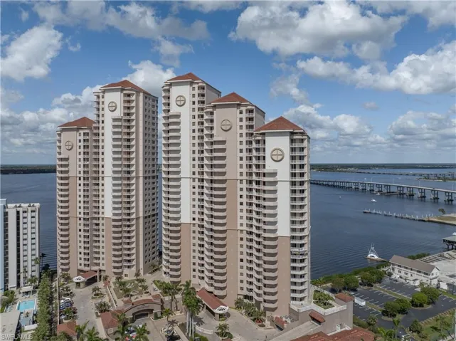 View of building exterior featuring a water view