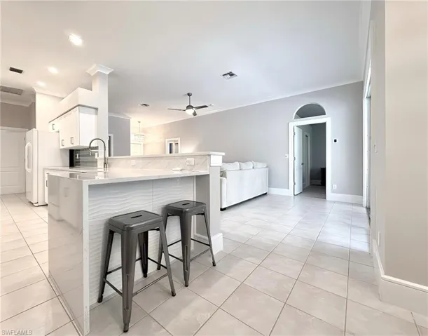 Breakfast Bar with Quartz Waterfall Edge