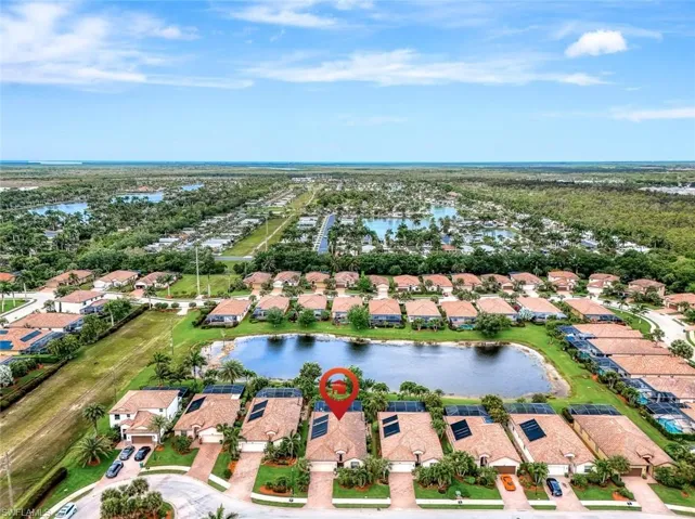 View of property location with nearby suburban area and a large body of water