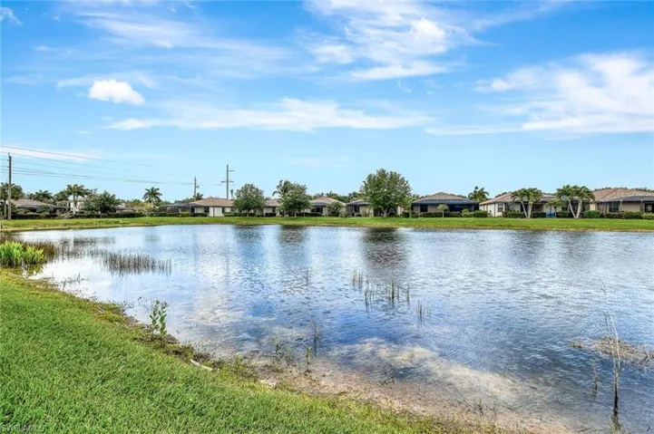 Water view featuring nearby suburban area