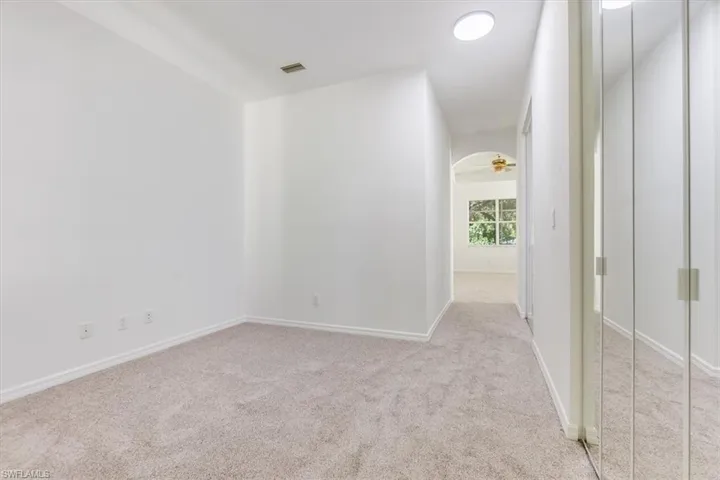 Sitting room or dressing room in primary - with double walk-in closets