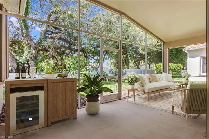 Virtually Staged Screened Lanai Entertainment area