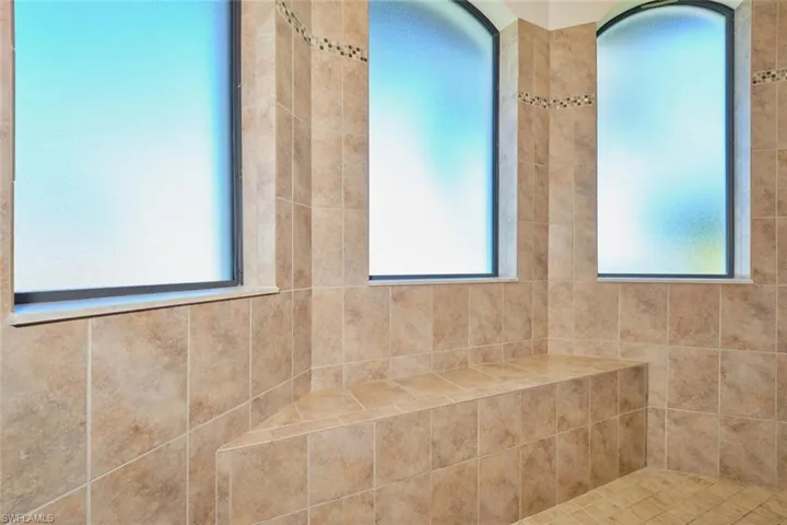 Full bathroom with a wealth of natural light