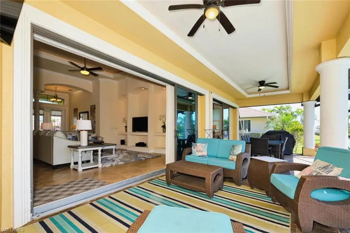 View of patio / terrace with an outdoor hangout area, a grill, and a ceiling fan