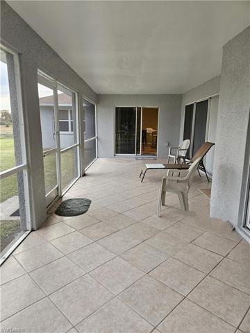 Screened Porch entry to Breakfast Area, Kitchen & Family Room in the background