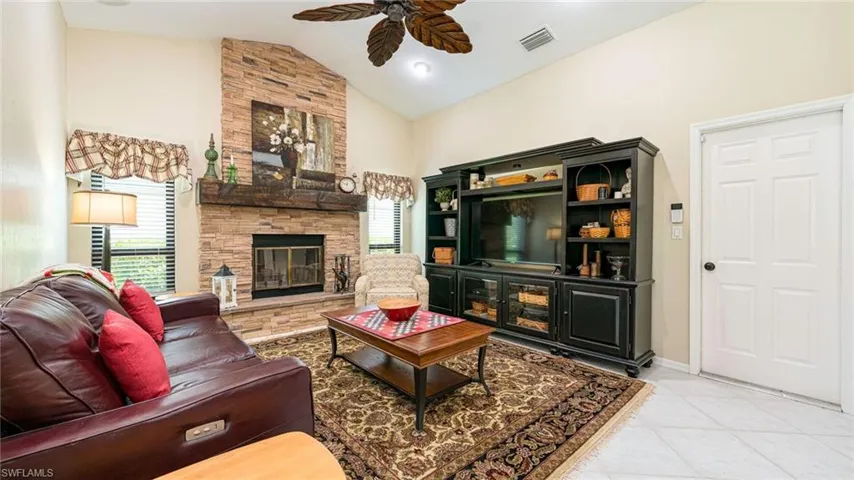 Den/Family room, tile floor, 2 windows