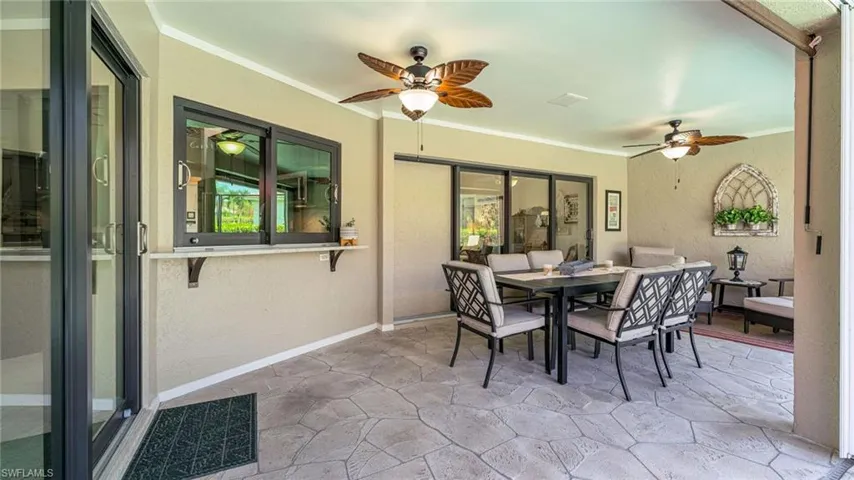 Outdoor Living with Pass through window for Entertaining, Dining space & Ceiling Fan