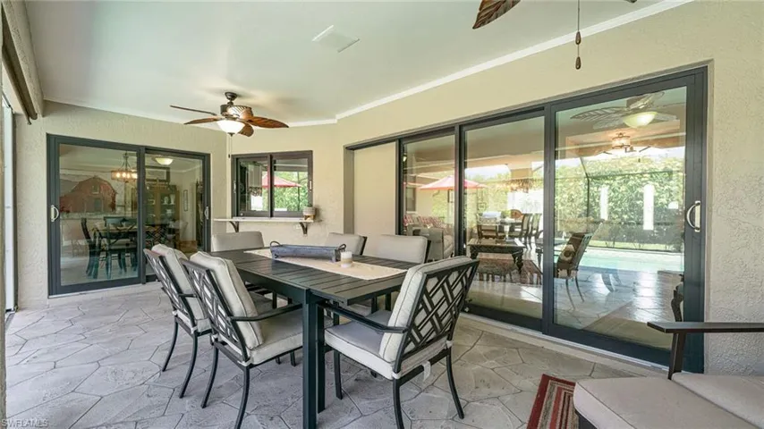 Screened in Lanai Pool area with Dining Space