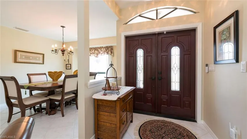 Double Door entrance Tiled Foyer