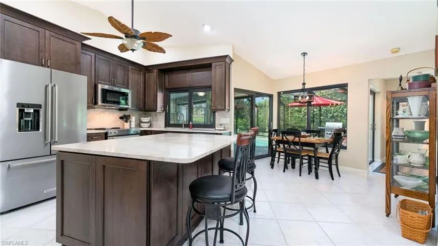 New Kitchen Cabinets with Stainless Steel Appliances, Leathered Taj Mahal Quartzite Counter Tops