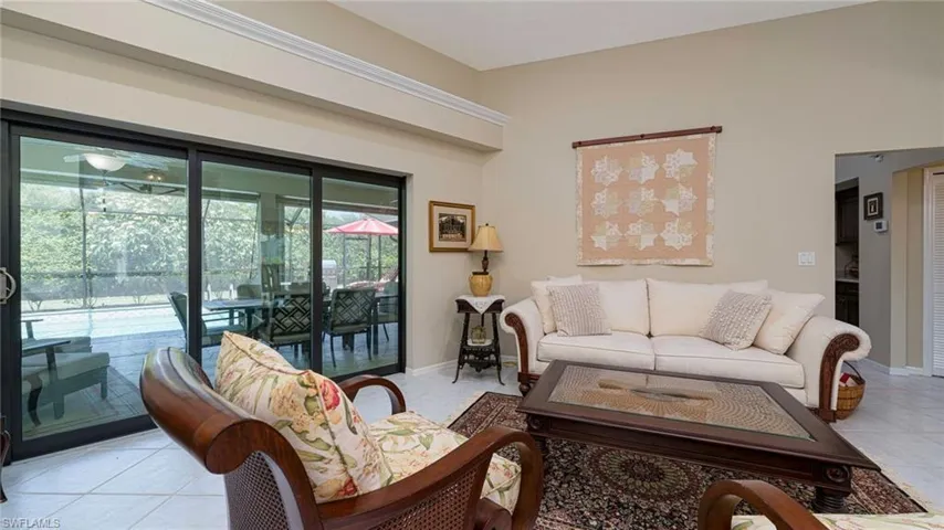 View of Living room with Sliders out to Lanai