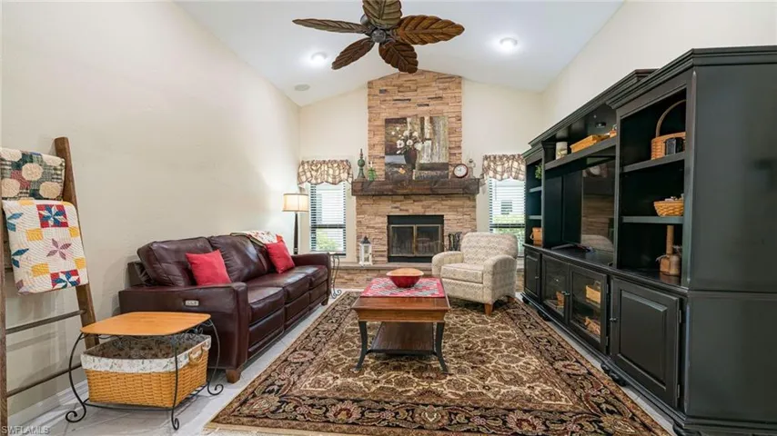 Den/Family Room off Kitchen with Real Wood Fire Place