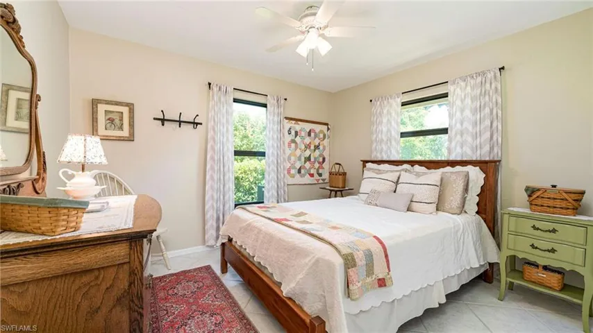 2nd Bedroom Tiled floors 2 windows & Ceiling Fan