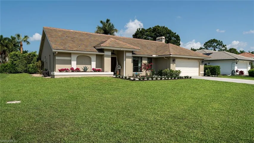 Single Family Home with 2 car garage and a NEW front yard Landscaping