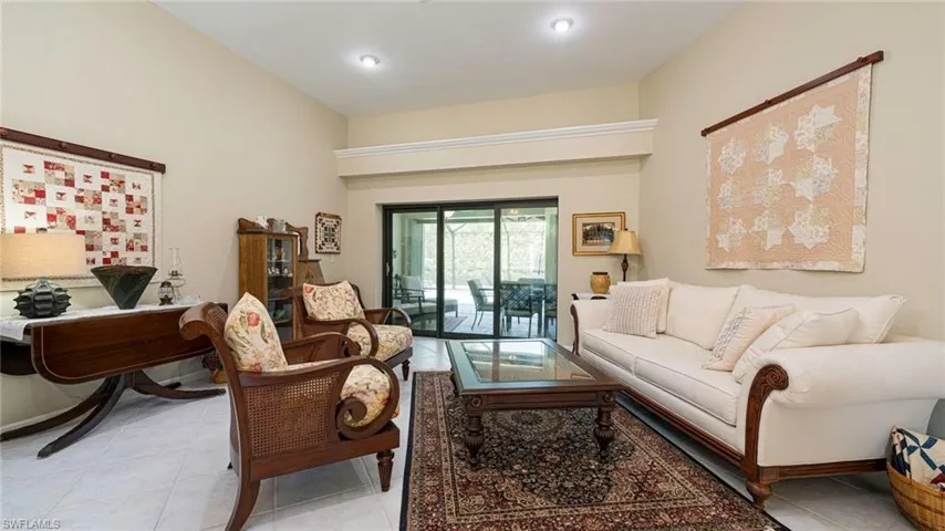 View of Living room with Sliders out to Lanai