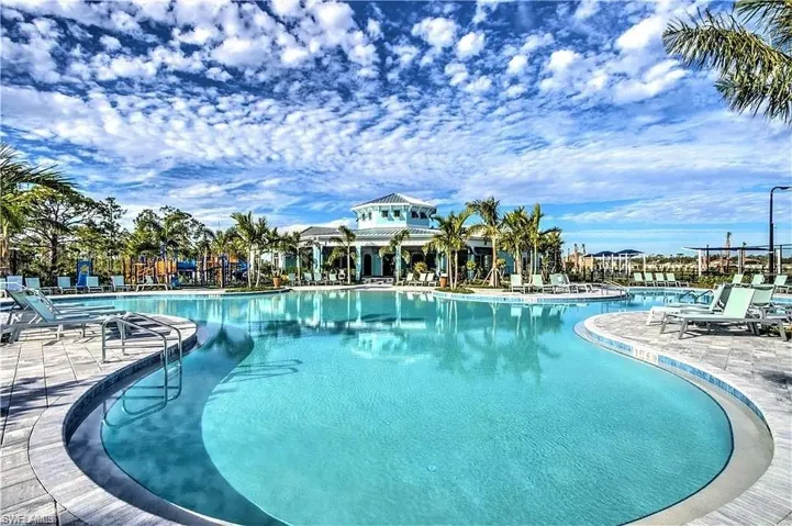 Community pool featuring a patio area