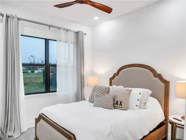 Bedroom featuring ceiling fan and recessed lighting