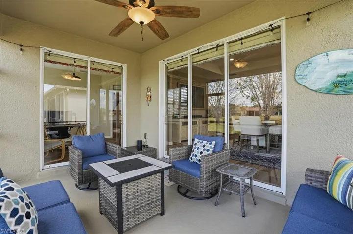 View of patio with outdoor furniture and ceiling fan