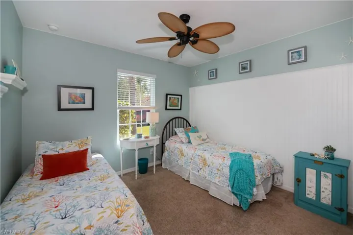 Bedroom featuring carpet flooring and ceiling fan