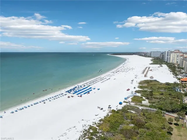 View of water feature featuring a beach view
