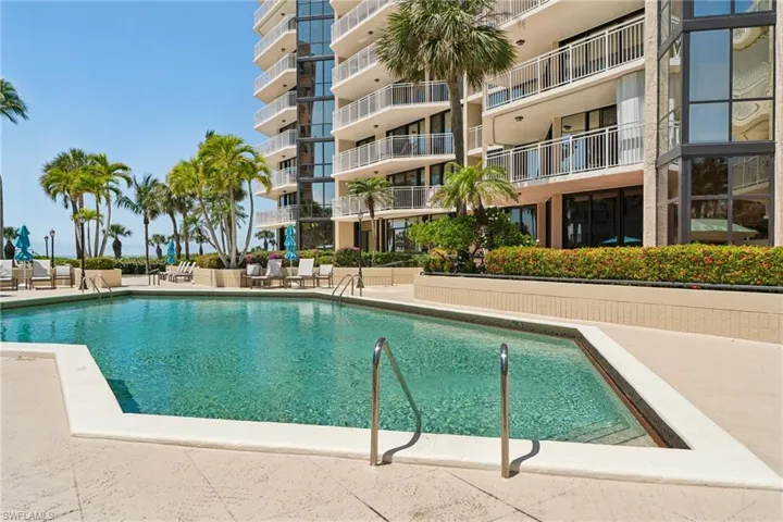 Community pool featuring a patio