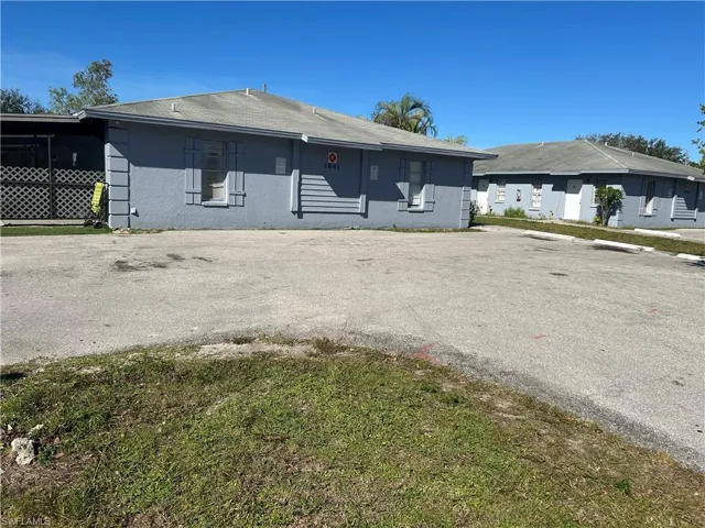 Single story home with a front lawn