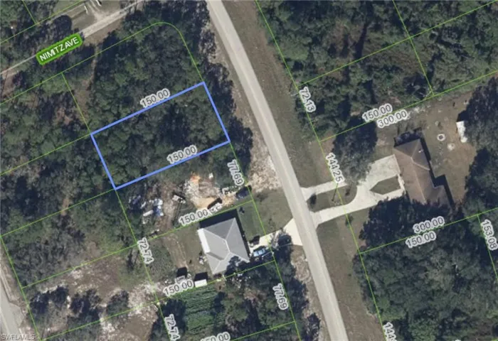 Aerial view of property's location featuring property parcel outlined