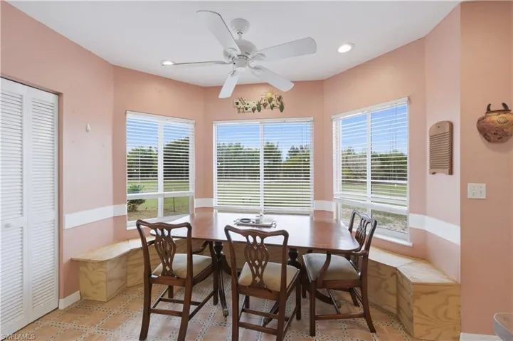 Dining room with ceiling fan and recessed lighting