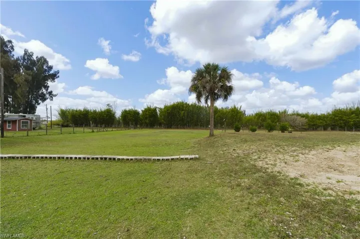 View of grassy yard with a view of rural / pastoral area
