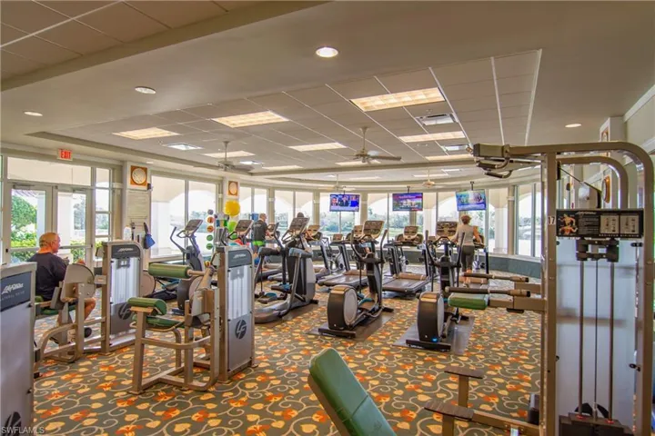 Exercise area with plenty of machines and workout room
