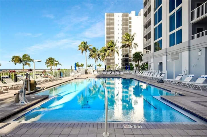Relax poolside with your favorite book.