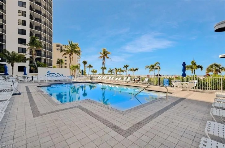 Located alongside the beach, the pool provides a resort-style setting with effortless access to the shoreline beyond.