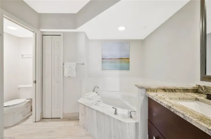 Featuring dual sinks, the bathroom offers comfort and convenience for daily routines.
