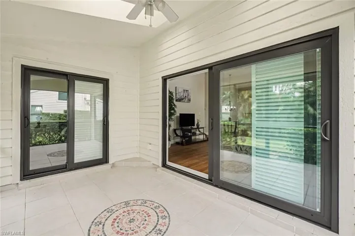 Tile flooring, ceiling fan, overlooking private backyard