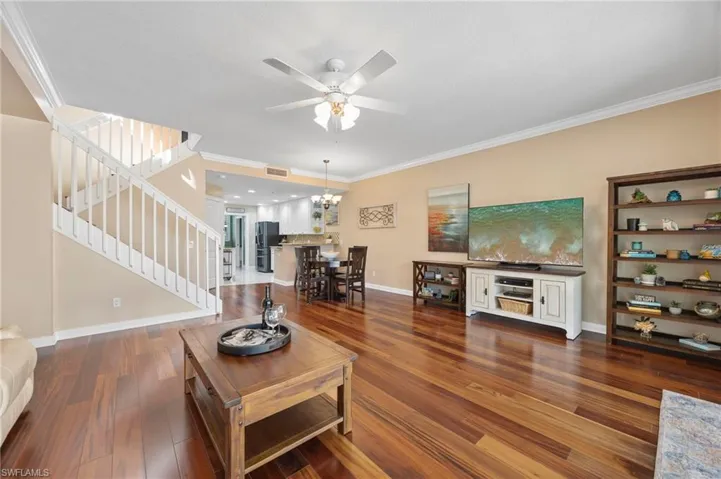 Living room with view of kitchen and dining area