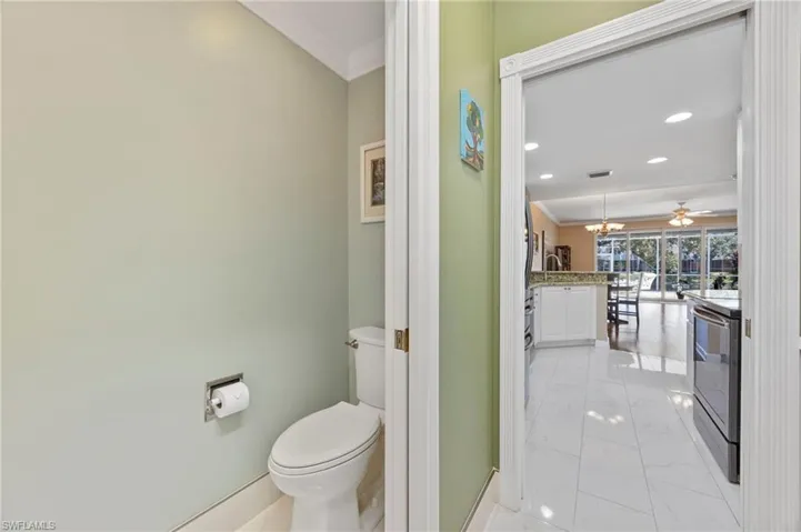 Half bath located through laundry room