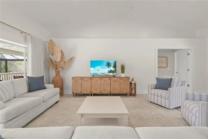 Living area featuring baseboards
