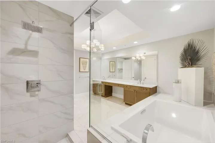 Double vanity, soaking tub and an oversized walk-in shower.