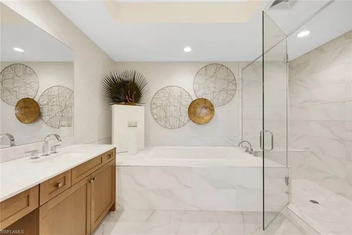 Spacious shower and a soaking tub rivaling any spa!