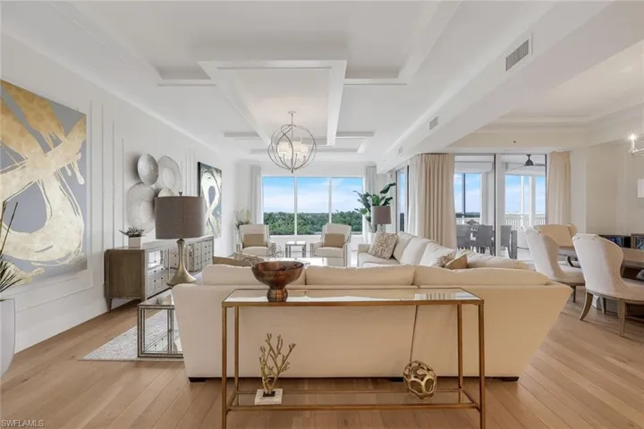 Modern and open floor plan with stunning views of one of the FIVE Bonita Bay golf courses and the Estero Bay!