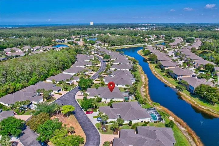 Drone / aerial view featuring a residential view and a water view