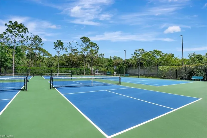 View of sport court with community basketball court and fence