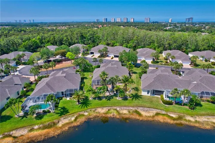 Drone / aerial view featuring a residential view and a water view