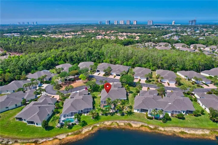 Bird's eye view featuring a water view and a residential view
