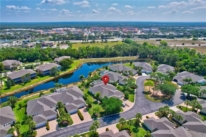 Bird's eye view featuring a water view and a residential view