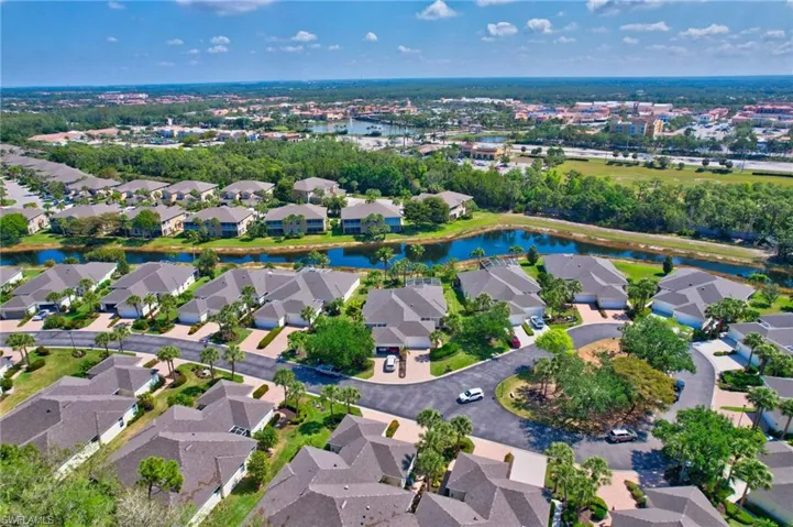Drone / aerial view featuring a residential view and a water view