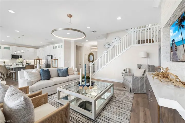 Living room with hardwood / wood-style floors